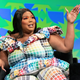 Grammy-winning singer, rapper, songwriter and flutist Lizzo appears on stage during the keynote session ‘Lizzo’ at the 2022 SXSW Conference and Festival at the Austin Convention Center in Austin, Texas, on March 13, 2022. (Photo by SUZANNE CORDEIRO / AFP) (Photo by SUZANNE CORDEIRO/AFP via Getty Images)